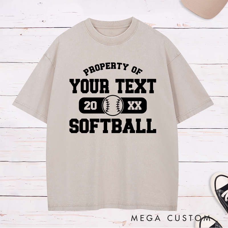 Personalized "Property of" Softball Washed T-Shirt Design Featuring Custom Text Year and Central Softball Graphic for a Classic Team Look