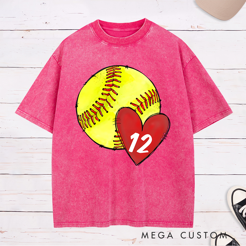 Personalized Softball Washed T-Shirt Design Featuring Hand-Drawn Softball Graphic Heart Element and Customizable Player Jersey Number for a Unique Supportive Look
