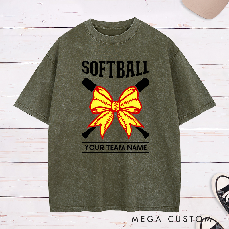 Personalized Softball Team Washed T-Shirt Design Featuring Customizable Team Name Striking Softball Bow Graphic and Crossed Bats