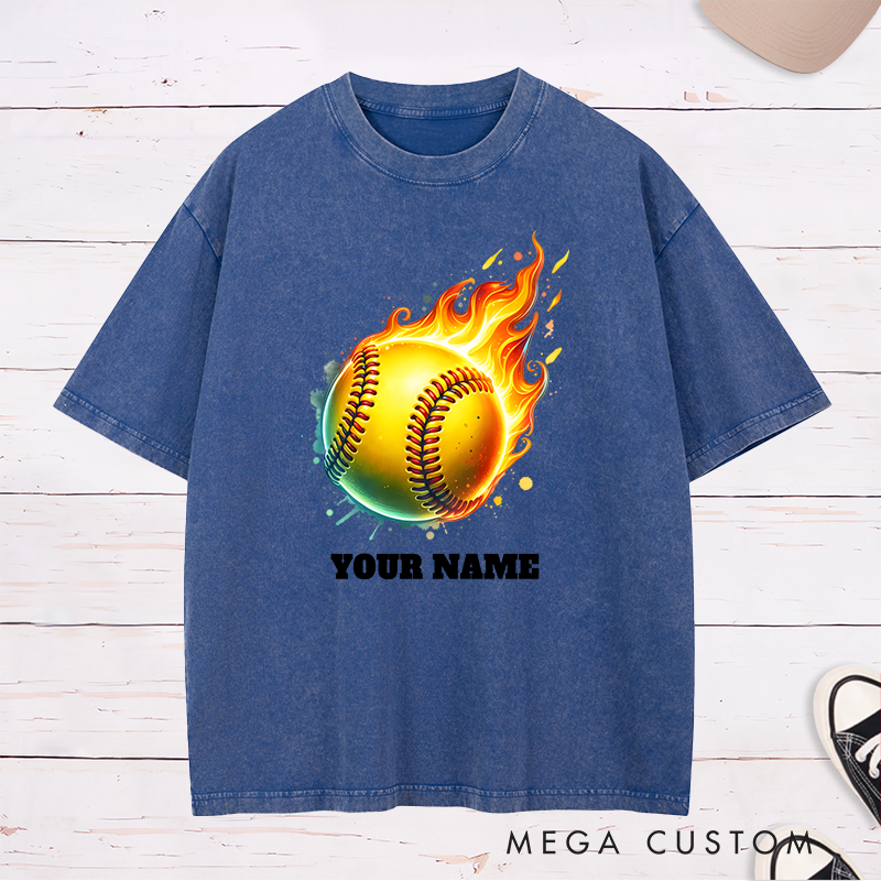 Personalized Fiery Softball Washed T-Shirt Design Customizable Name Featuring a Dynamic Flaming Softball Graphic Perfect for Teams and Players
