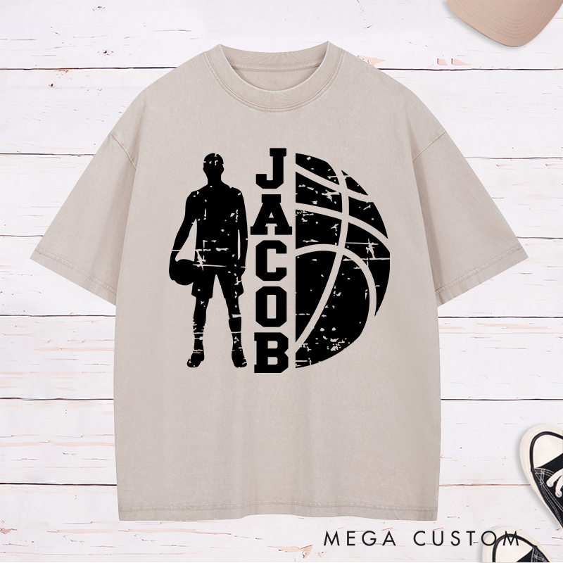 Personalized Washed T-Shirt Design Featuring a Distressed Basketball Player Silhouette with Customizable Vertical Name and Bold Graphic Style