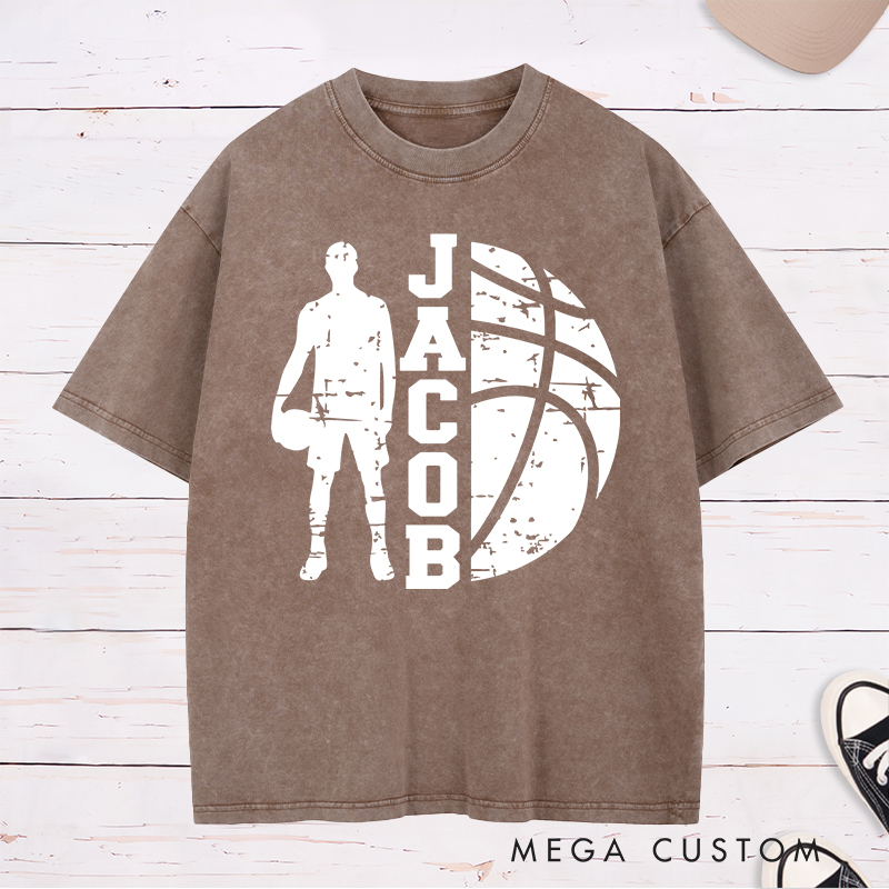 Personalized Washed T-Shirt Design Featuring a Distressed Basketball Player Silhouette with Customizable Vertical Name and Bold Graphic Style