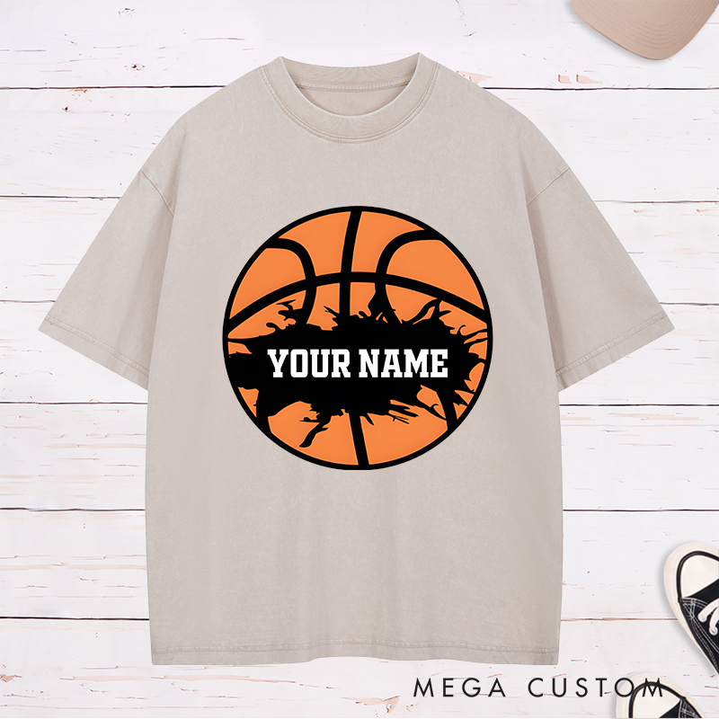 Personalized Washed T-Shirt Design Featuring a Bold Basketball Graphic with Splatter Effect and Customizable Name