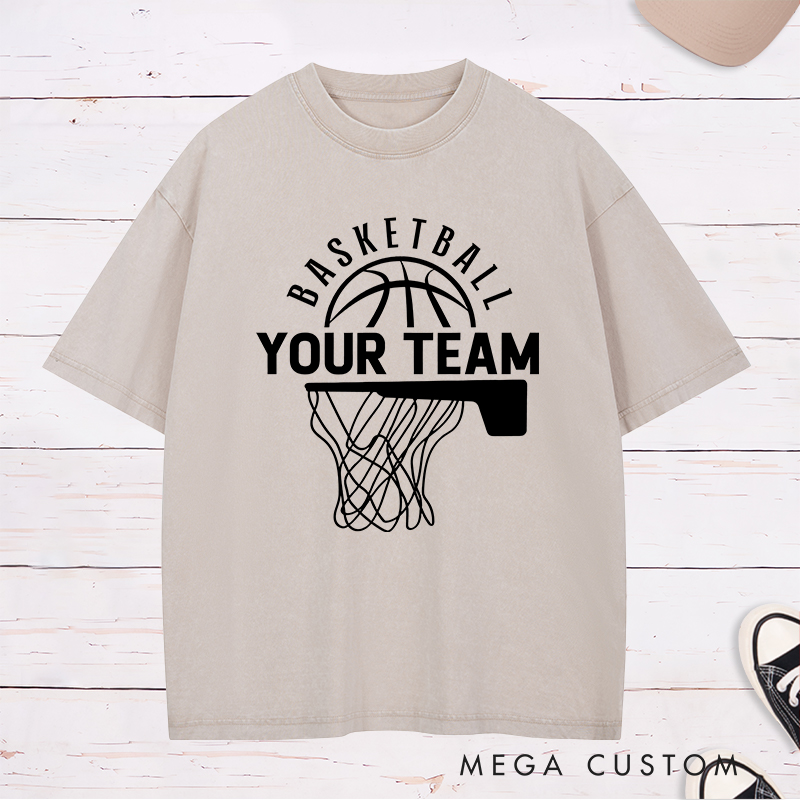 Personalized Washed T-Shirt Design Featuring a Basketball Hoop and Arched Basketball Text with a Customizable Team Name