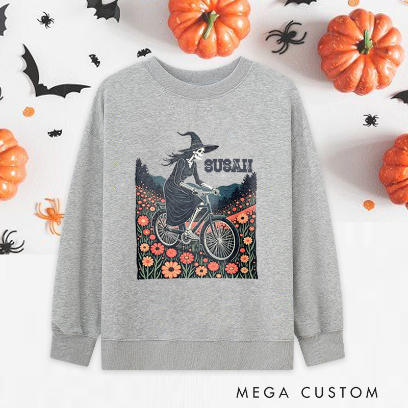 Personalized Halloween Classic Sweatshirts with Witch Skeleton Riding Bike Through Floral Field for Fitness Enthusiasts Bodybuilders and Gym Lovers