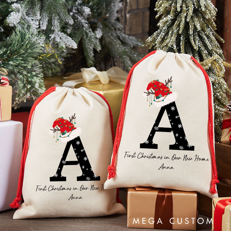 Personalized First Christmas in Our New Home Gift Bag Custom Christmas Sack with Name Initial Santa Hat Design Holiday Decoration New Home Keepsake