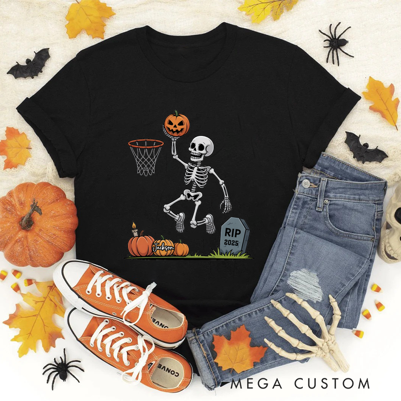 Personalized Halloween Basketball T-Shirt with Skeleton Dunking a Pumpkin Design and Customizable Year