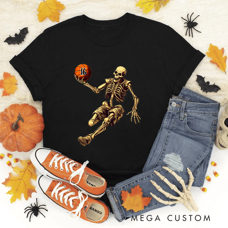 Personalized Halloween Basketball T-Shirt with Skeleton Dribbling Pumpkin Ball and Customizable Number Design