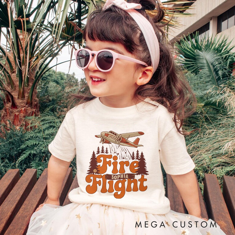 Personalized Fire Flight Kids T-Shirt with Custom Name and Retro Aerial Firefighter Plane Graphic for Little Adventurers Kids T-Shirt