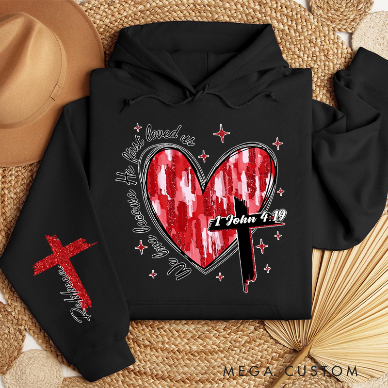 Personalized We Love Because He First Loved Us Classic Hoodies with Custom Name Heart Cross Valentine Bible Verse Hoodie Love Jesus Valentine Day Gift