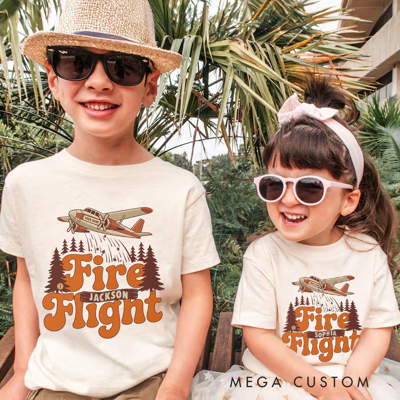 Personalized Fire Flight Kids T-Shirt with Custom Name and Retro Aerial Firefighter Plane Graphic for Little Adventurers Kids T-Shirt