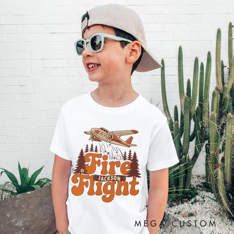 Personalized Fire Flight Kids T-Shirt with Custom Name and Retro Aerial Firefighter Plane Graphic for Little Adventurers Kids T-Shirt
