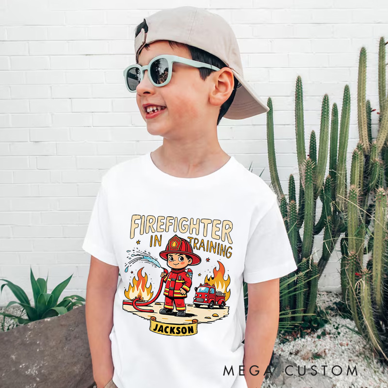 Personalized Firefighter in Training Kids T-Shirt with Custom Name and Cute Cartoon Firefighter Graphic for Aspiring Heroes Kids T-Shirt
