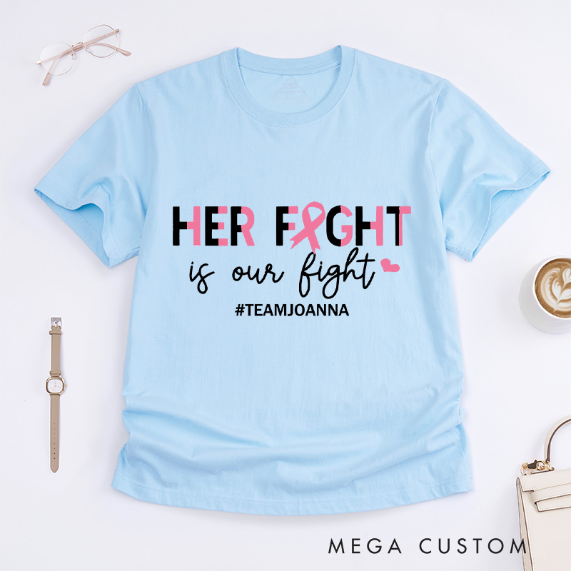 Personalized Warrior Her Fight Is Our Fight T-shirt combining a pink ribbon design with empowering words for breast cancer awareness.