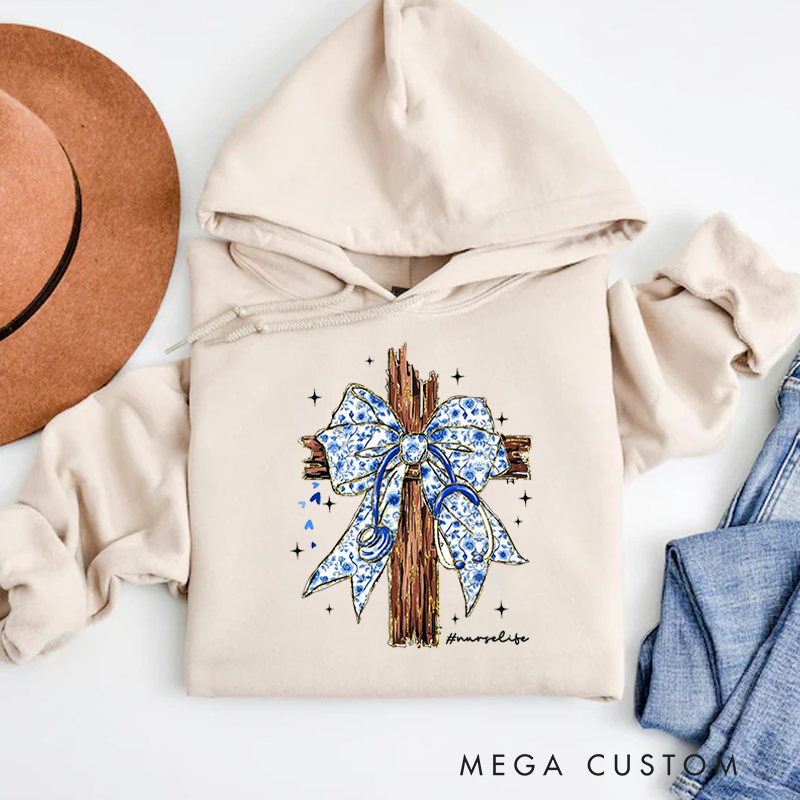 Personalized Hoodies for Nurse Wooden Cross Adorned with a Blue Ribbon Tied Hoodies Appreciation Gift for Nurse