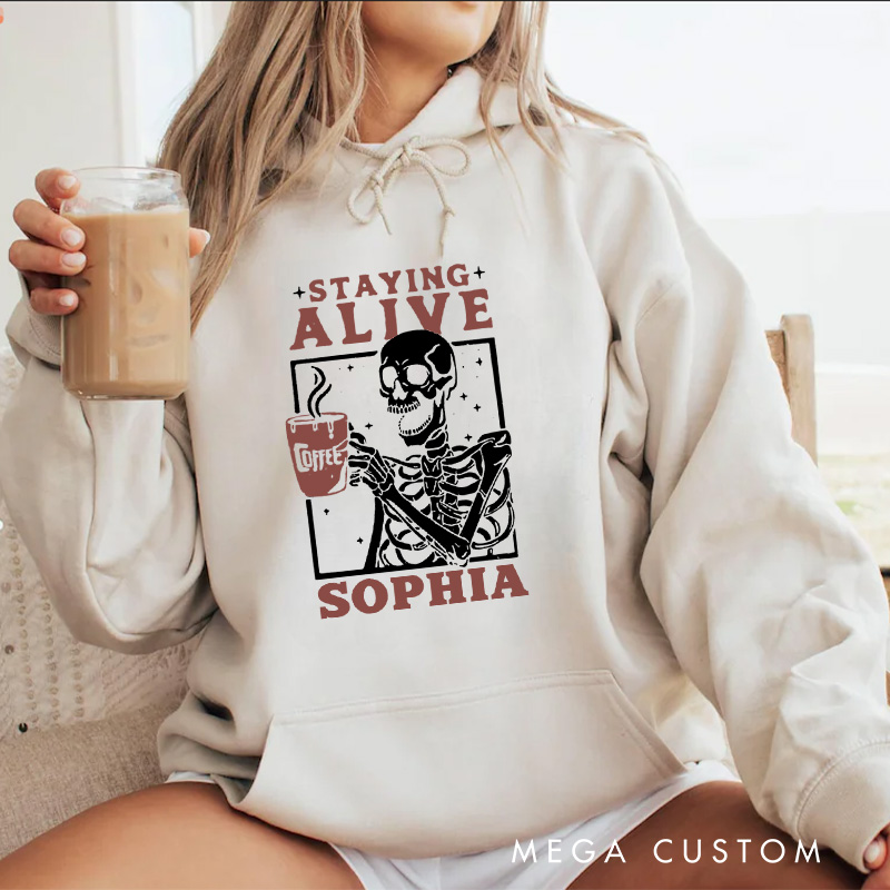 Personalized Skeleton Drinking Coffee Staying Alive Halloween Vibes Hoodies