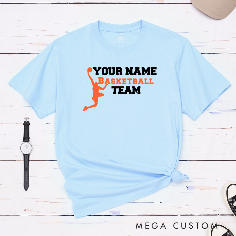 Personalized Basketball Team T-Shirt Design Featuring Custom Name Bold Text and Dynamic Player Silhouette Graphic