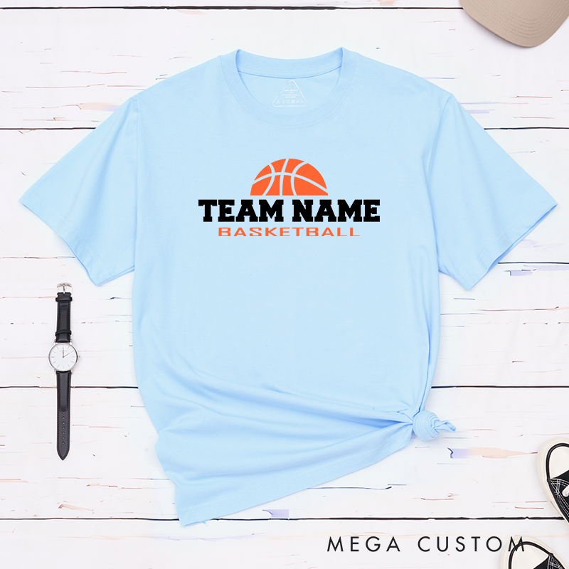 Personalized Basketball Team T-Shirt Design Showcasing Bold Team Name Text and a Striking Orange Basketball Graphic for a Sporty and Dynamic Look