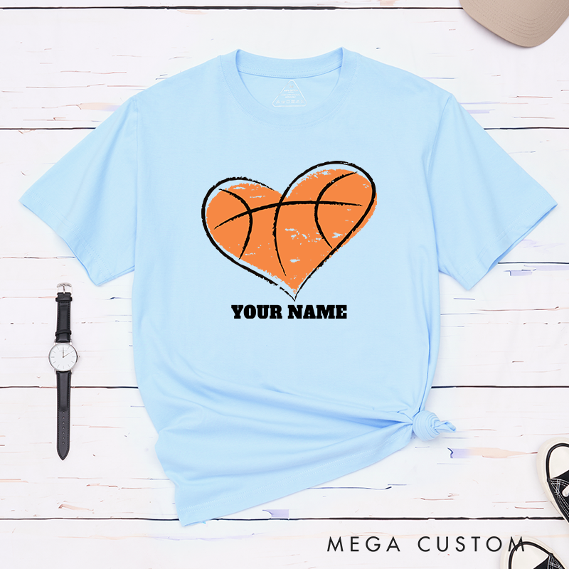 Personalized Basketball T-Shirt Design Featuring Heart Shaped Basketball Graphic Customizable Name Bold Text and Distressed Artistic Style