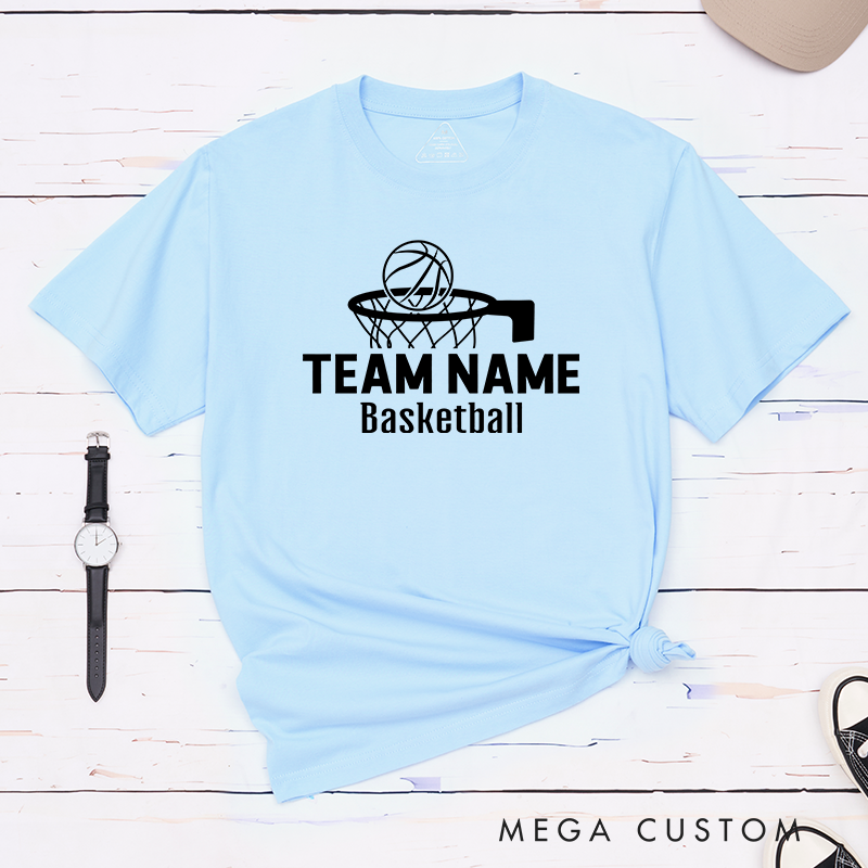 Personalized Basketball T-Shirt Design Showcasing Custom Team Name Bold Basketball Hoop Graphic Dynamic Ball Illustration and Clean Text Layout