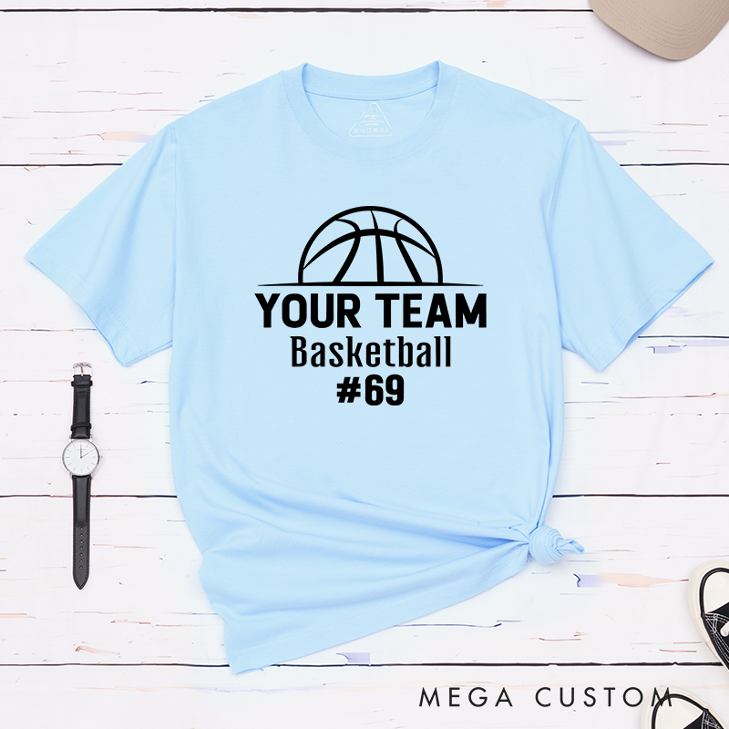 Personalized Basketball T-Shirt Design Showcasing Custom Team Name Bold Basketball Graphic Sleek Text Layout and Prominent Player Number Display