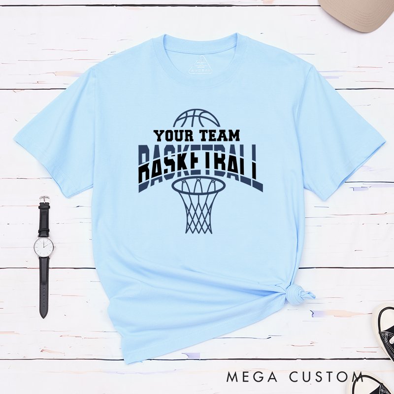 Personalized Basketball T-Shirt Design Featuring Custom Team Name Bold Arched "Basketball" Text Dynamic Hoop Graphic and Stylish Basketball Accent