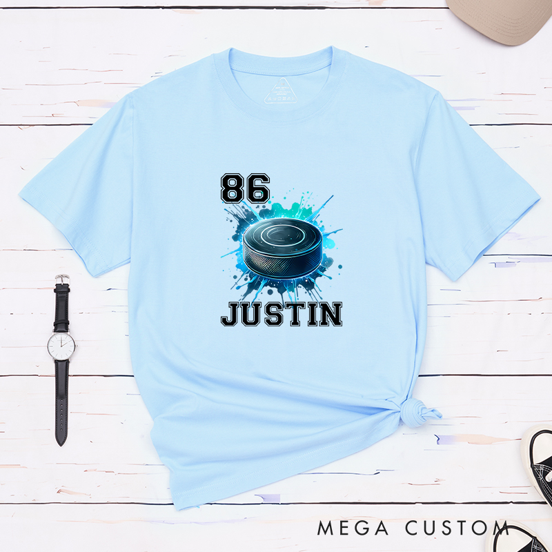 Personalized Athletic T-Shirt Featuring a Vibrant Hockey Puck Graphic and Custom Name