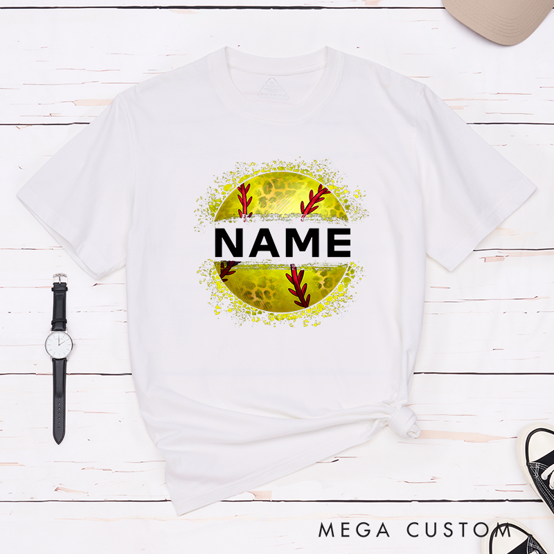 Personalized Softball T-Shirt Design Featuring Custom Name Displayed Boldly Across a Distressed Softball Graphic with Textured Details