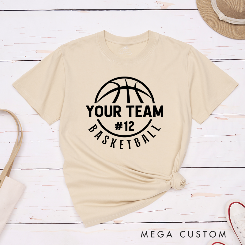 Personalized Basketball T-Shirt Design Featuring Custom Team Name Circular Basketball Graphic Player Number and Stylish Arched Text