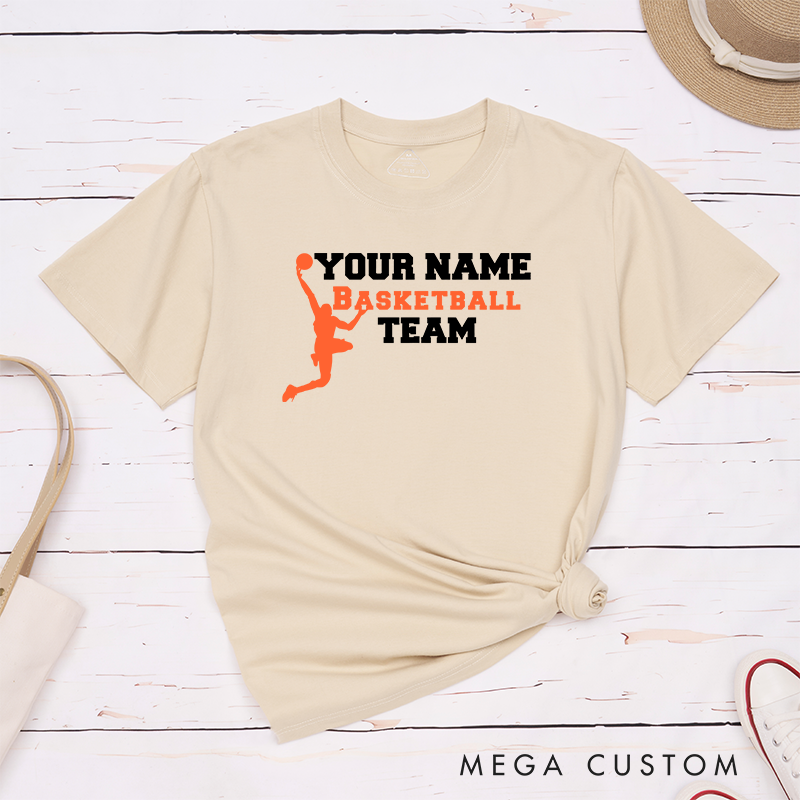 Personalized Basketball Team T-Shirt Design Featuring Custom Name Bold Text and Dynamic Player Silhouette Graphic
