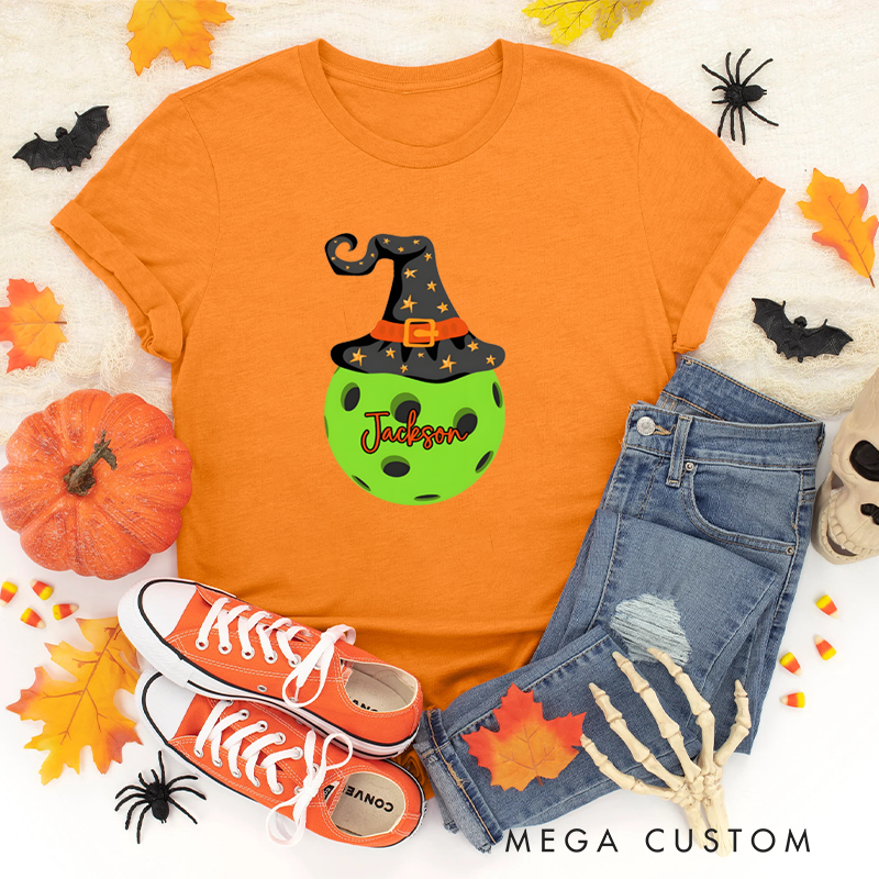 Personalized Halloween Pickleball T-Shirt with Witch Hat and Custom Name on Spooky Ball Design
