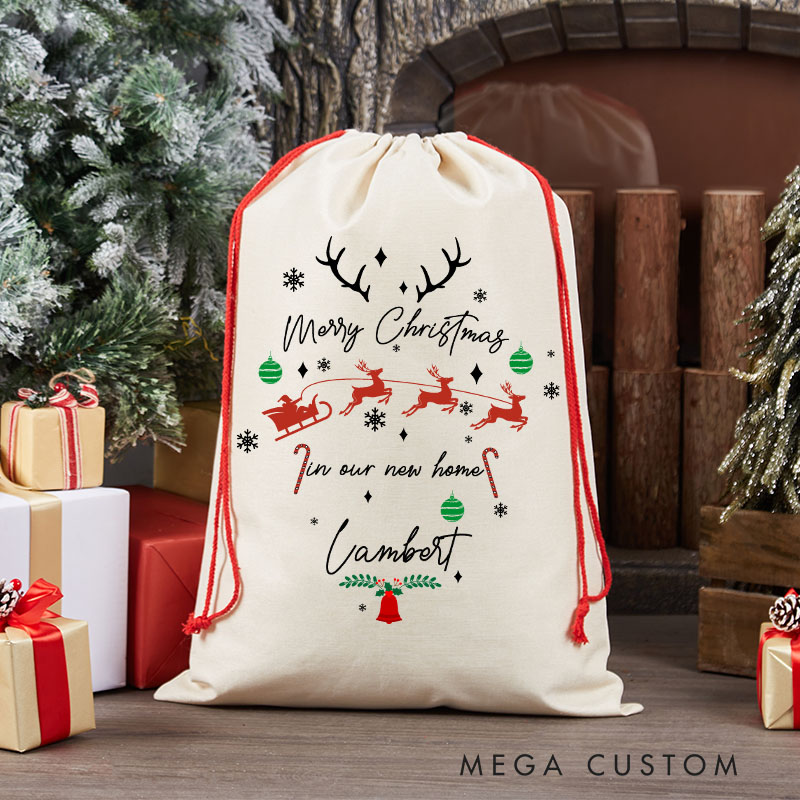 Personalized Merry Christmas in Our New Home Gift Bag Custom Christmas Sack with Name Reindeer and Sleigh Design Holiday Decoration New Home Keepsake
