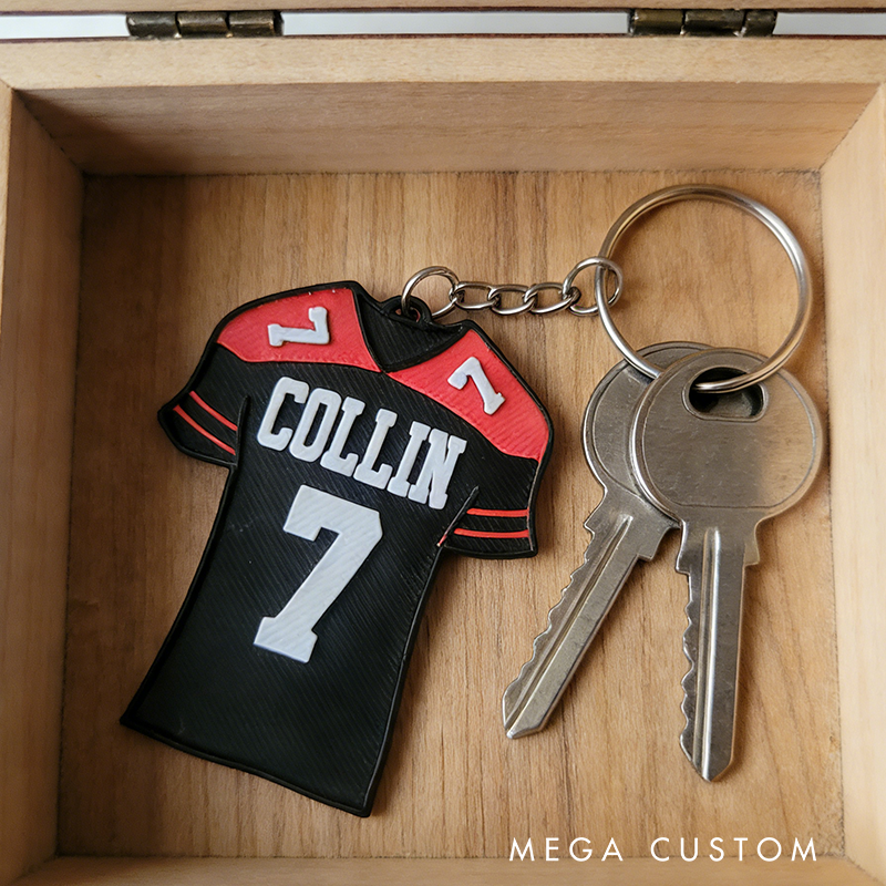 Personalized Football Jersey Keychains Featuring Custom Names and Numbers Design