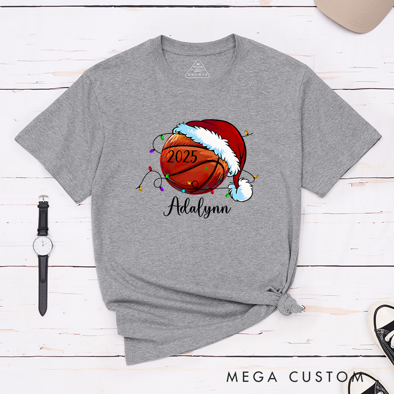 Personalized Festive T-Shirt with Custom Name, Year, and Basketball Santa Hat Design