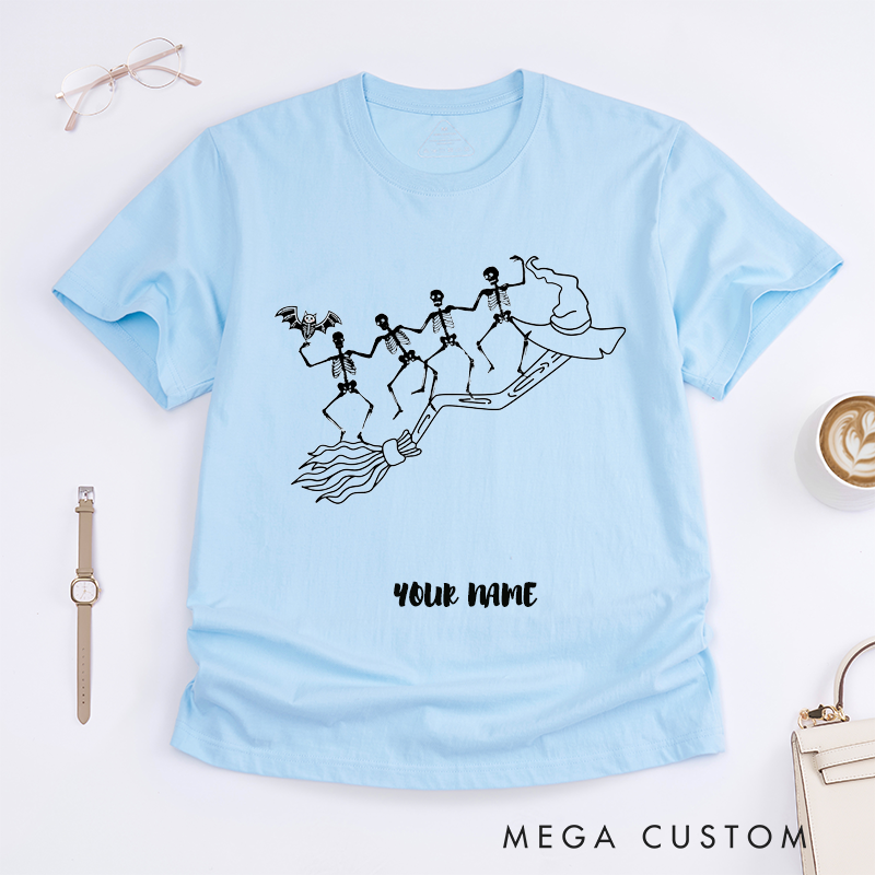 Personalized Skeletons Riding Broomstick Halloween T-Shirts Custom Name Witch Hat Gift for Him Dancing Skeleton Crew Unique Spooky Tee for Men