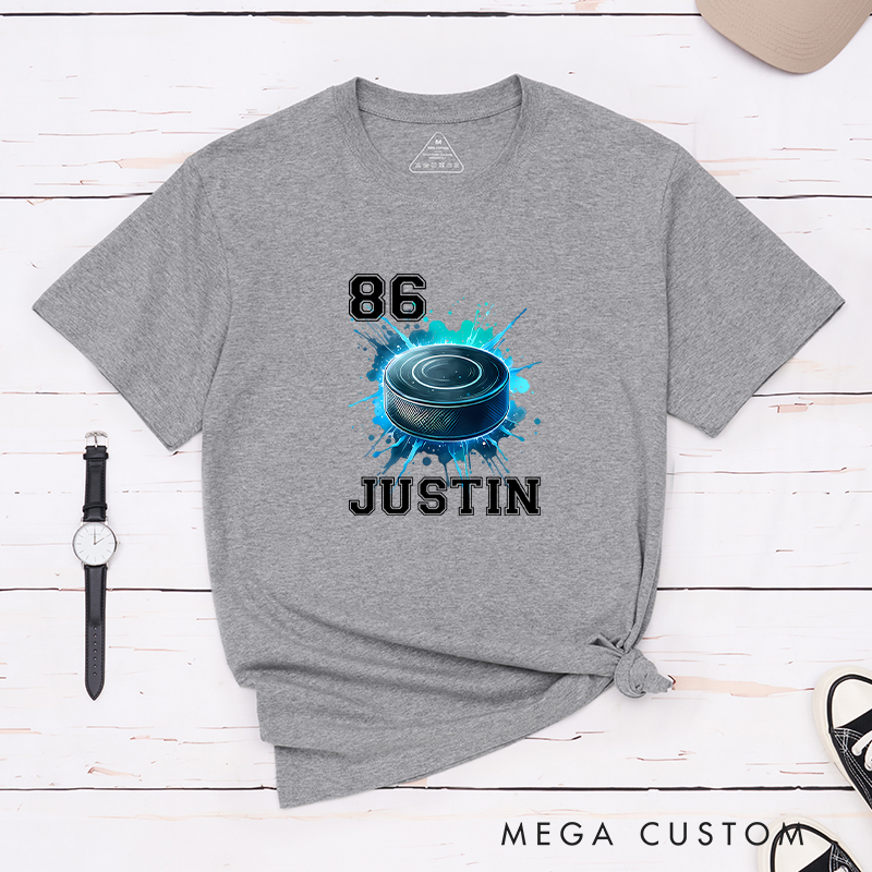 Personalized Athletic T-Shirt Featuring a Vibrant Hockey Puck Graphic and Custom Name