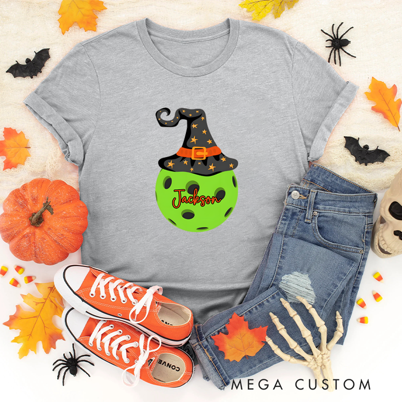 Personalized Halloween Pickleball T-Shirt with Witch Hat and Custom Name on Spooky Ball Design