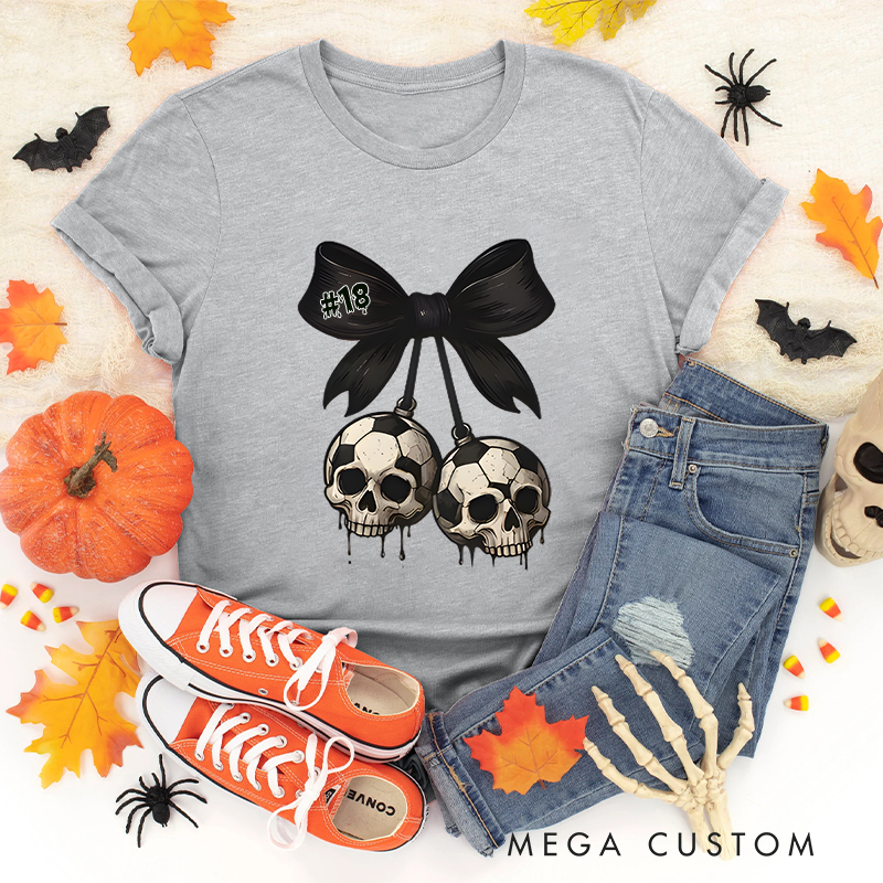 Personalized Spooky Soccer T-Shirt Featuring Custom Number and Skull Graphics 