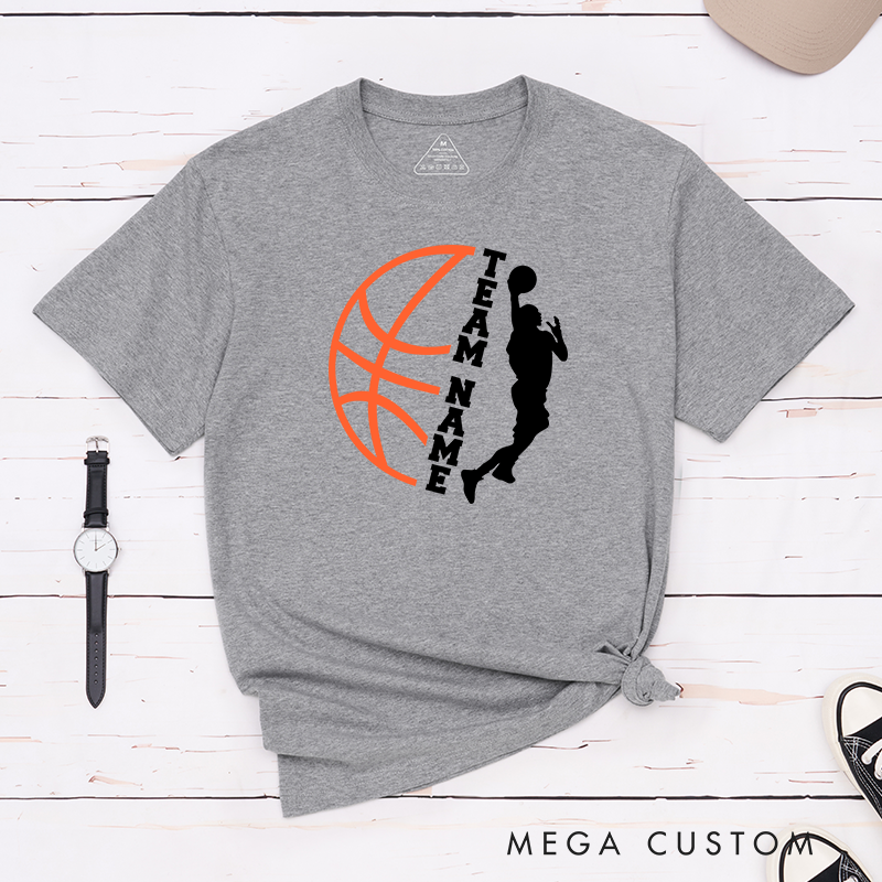 Personalized Basketball Team T-Shirt Design Featuring Custom Team Name Player Silhouette Bold Orange Basketball Graphic