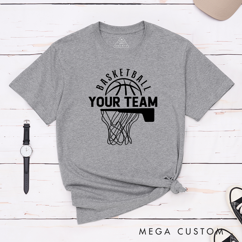 Personalized Basketball T-Shirt Design Showcasing Custom Team Name Bold Basketball Graphic Dynamic Hoop and Net Illustration and Stylish Arched Text Layout