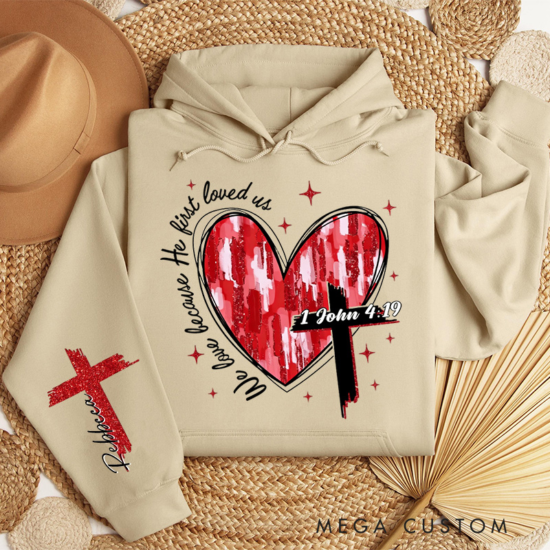 Personalized We Love Because He First Loved Us Classic Hoodies with Custom Name Heart Cross Valentine Bible Verse Hoodie Love Jesus Valentine Day Gift