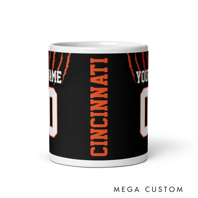 Personalized Football Mug with Customizable Team Name Player Name and Jersey Number in Bold Black and Orange Claw Design