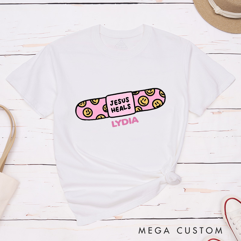 Personalized Jesus Heals Classic T-Shirt with Custom Name Smiley Faces Bandage Theme Religious Shirt Easter Gift for Christians Birthday Gift