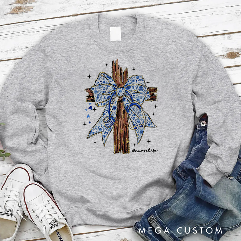 Personalized Nurse Sweatshirt Wooden Cross Adorned with a Blue Ribbon Tied Appreciation Gift for Nurse