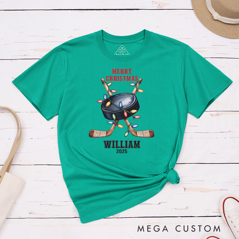 Personalized Christmas Hockey T-Shirt with Custom Name, Year, and Festive Holiday Lights Design