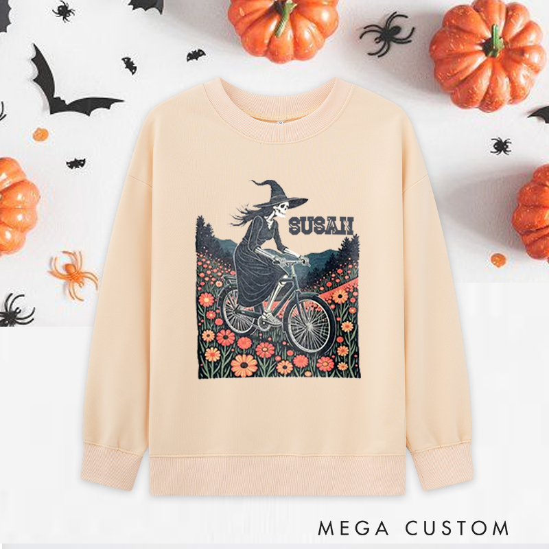 Personalized Halloween Classic Sweatshirts with Witch Skeleton Riding Bike Through Floral Field for Fitness Enthusiasts Bodybuilders and Gym Lovers
