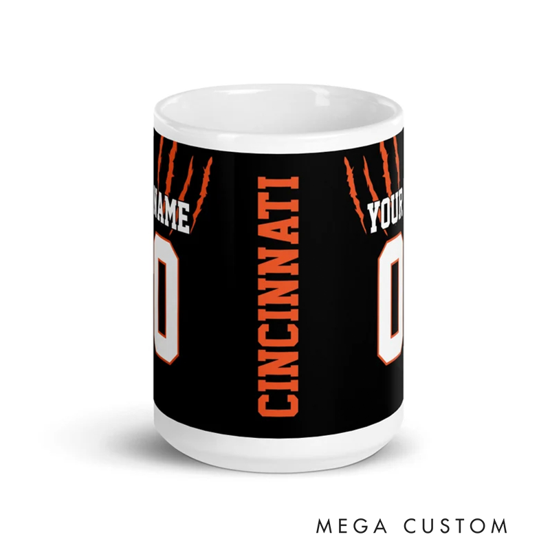 Personalized Football Mug with Customizable Team Name Player Name and Jersey Number in Bold Black and Orange Claw Design