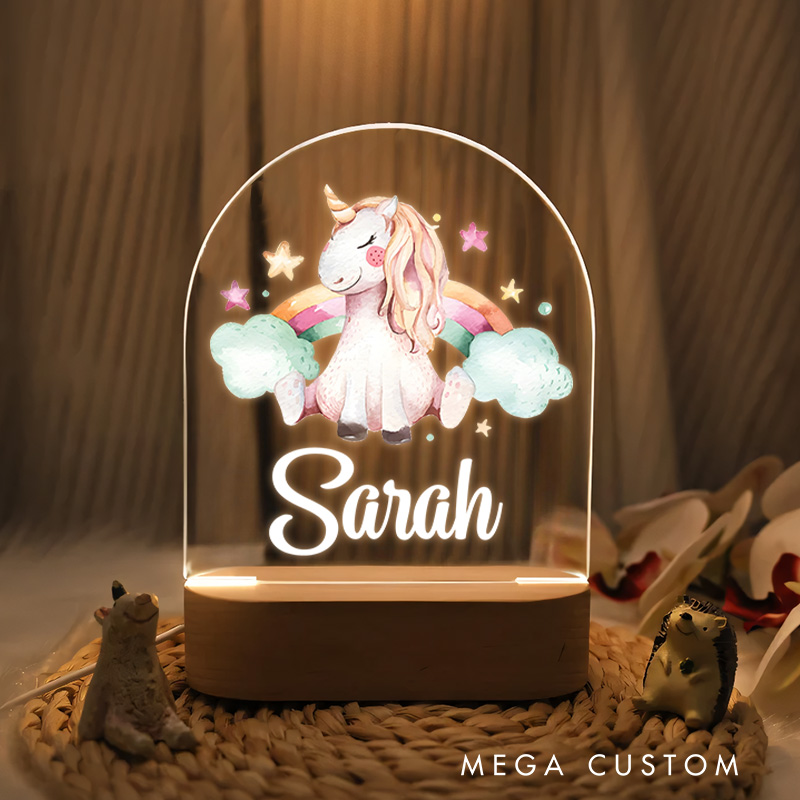 Personalized Adorable Unicorn with Flowing Mane Sitting on a Rainbow Surrounded by Clouds and Stars for a Magical Night Lamp