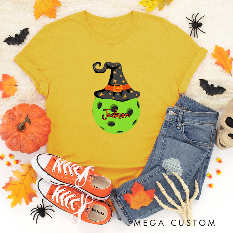 Personalized Halloween Pickleball T-Shirt with Witch Hat and Custom Name on Spooky Ball Design