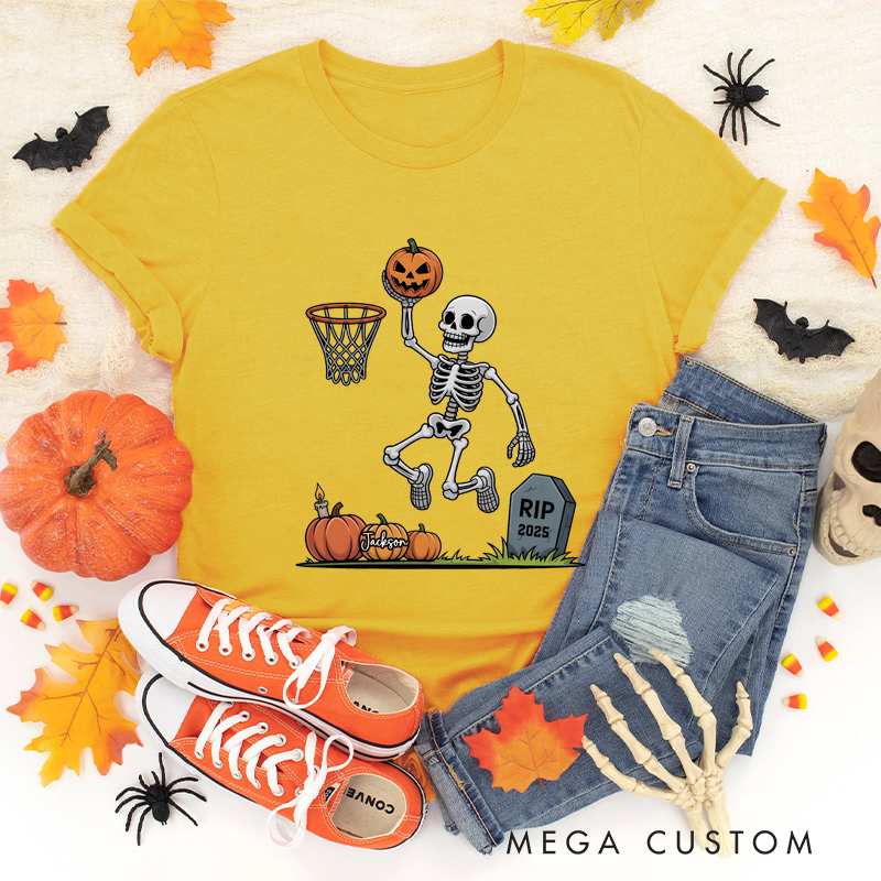 Personalized Halloween Basketball T-Shirt with Skeleton Dunking a Pumpkin Design and Customizable Year
